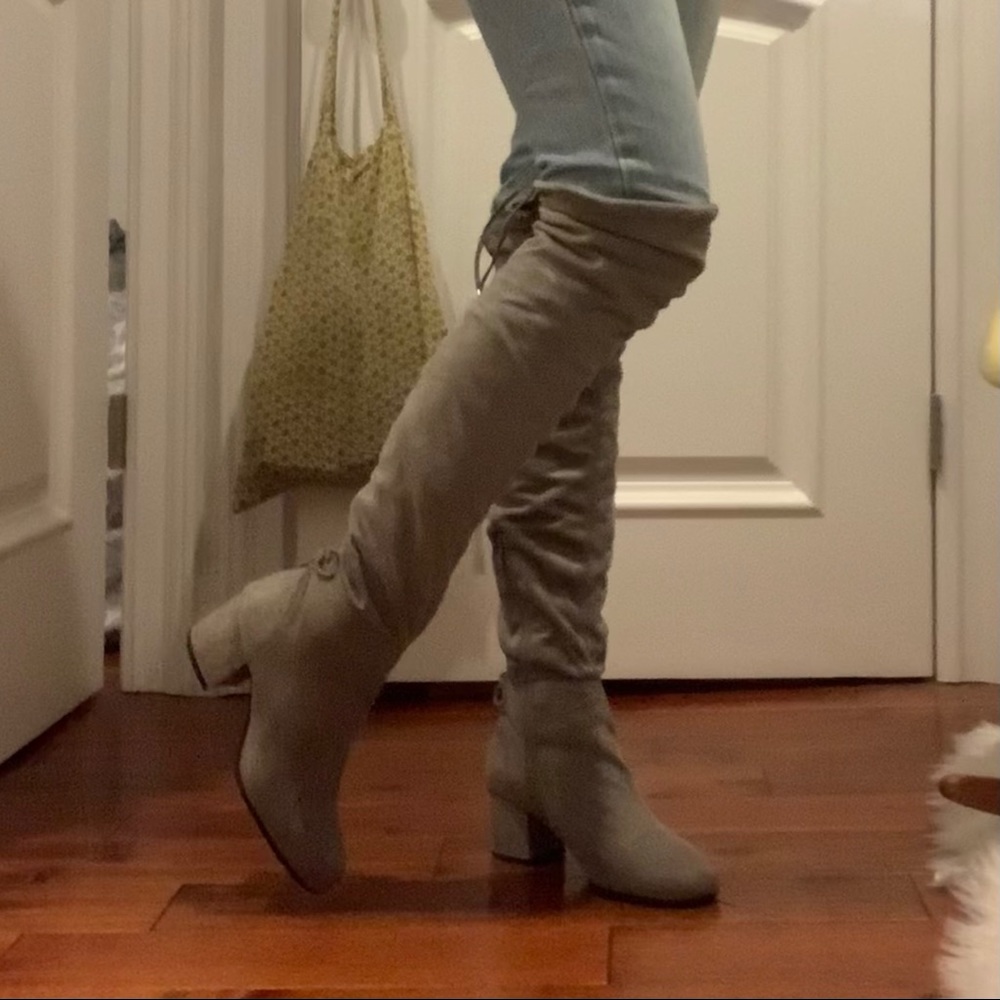 Gray high thigh boots. They are super comfy!